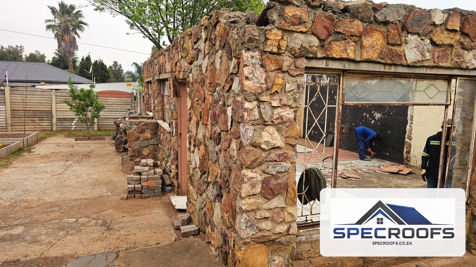 Exterior of a property during Specroofs renovation work