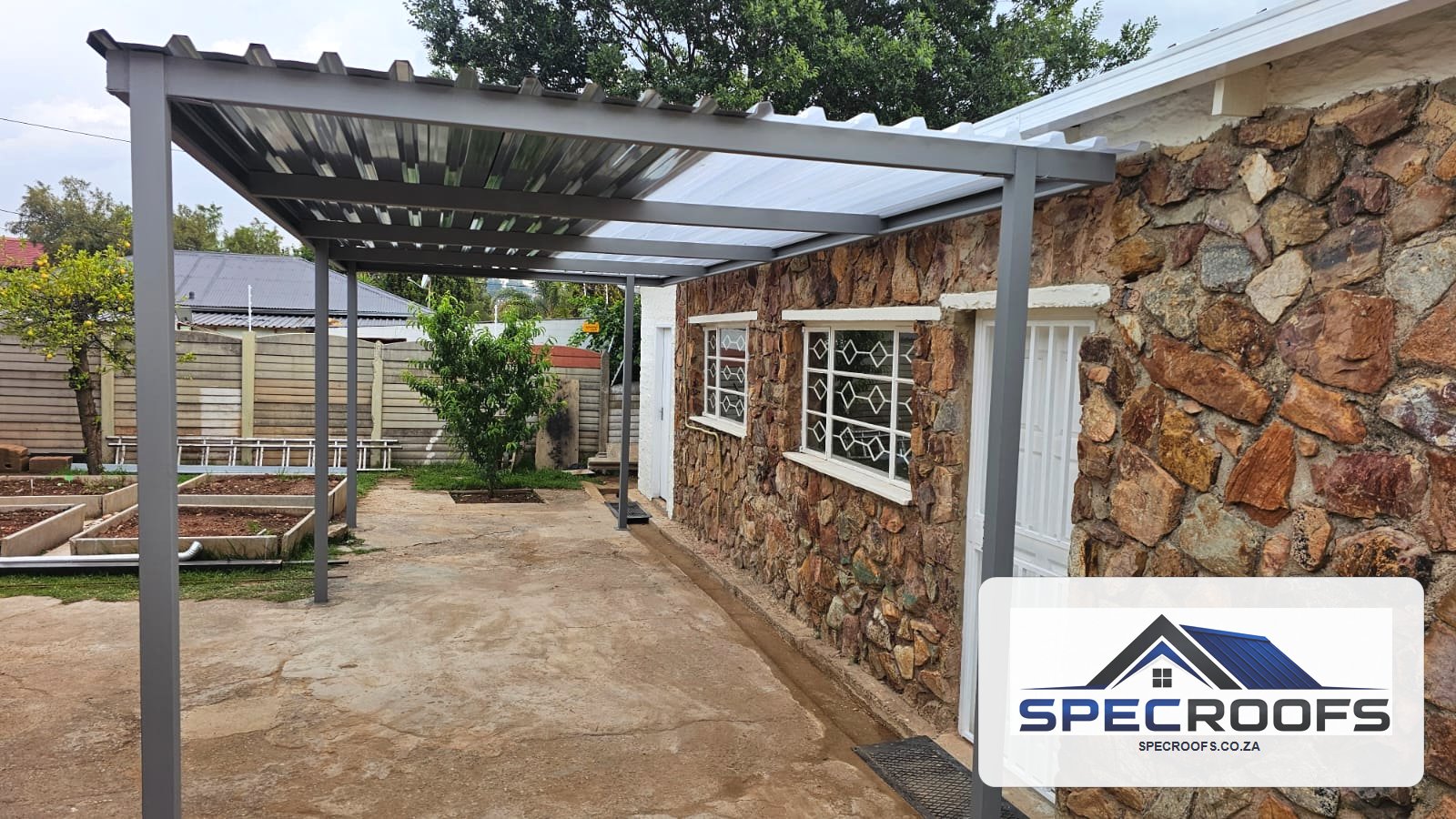 Completed steel carport roof built by Specroofs