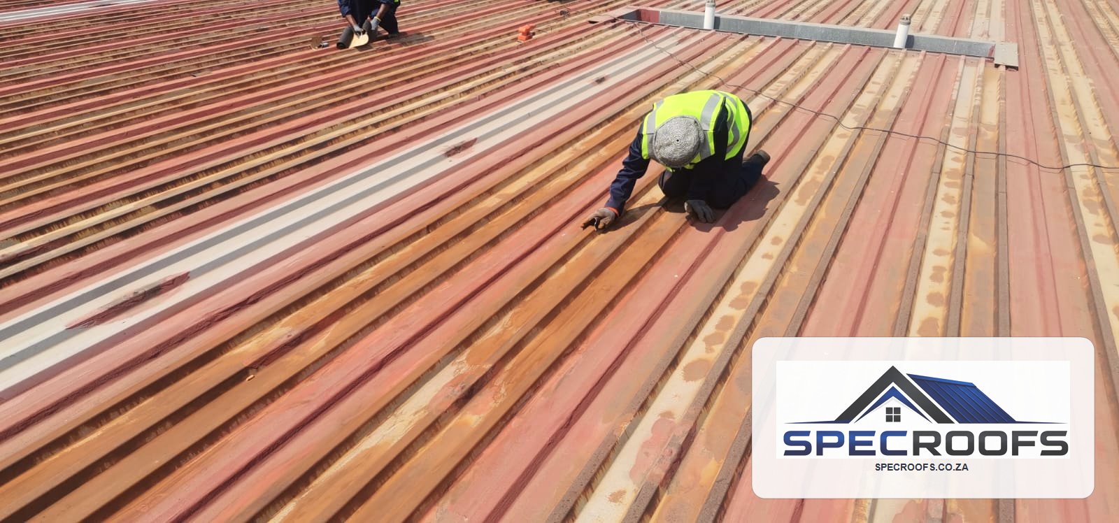 Specroofs technician preparing a metal roof repair