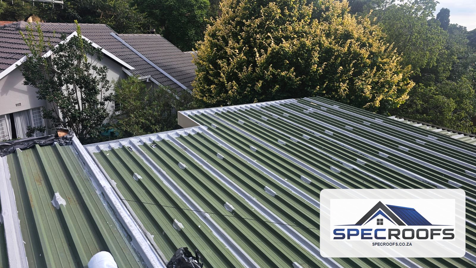 Detailed waterproofing repair on a Specroofs metal roof project